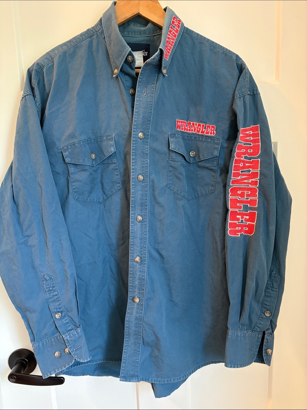 Vintage Blue Button-Front Shirt with Red Logos